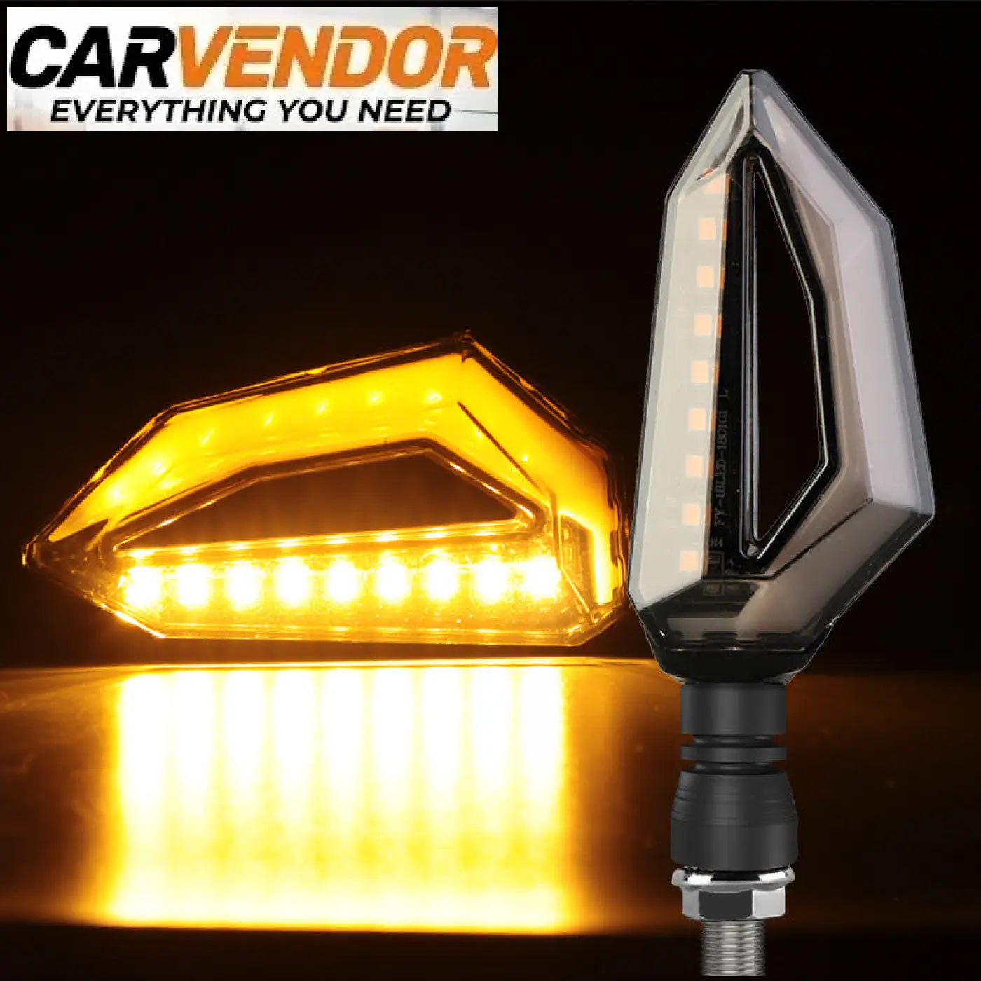 A sleek angular modernit led-vilkut motorcycle turn signal with translucent amber lens and black housing